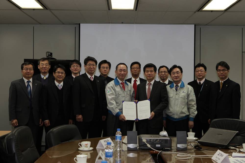 두산전자 MOU(20091216).jpg